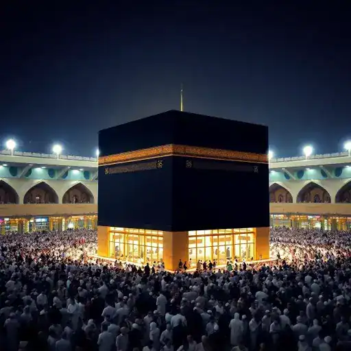 Night view of Kaaba surrounded by a large crowd of pilgrims in Makkah